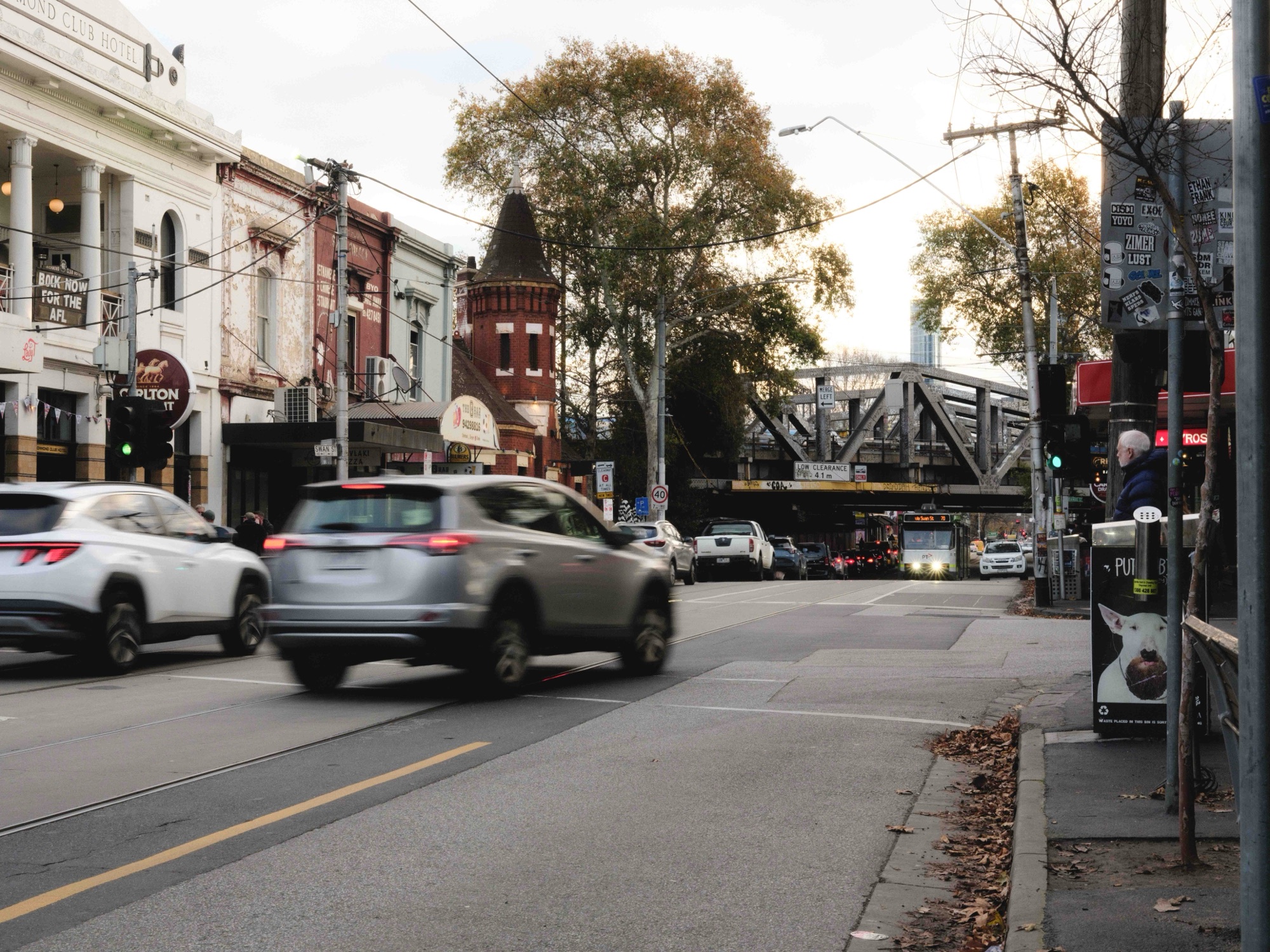 Heritage shopfronts, the Richmond Club Hotel and the railway bridge on Swan Street, Richmond